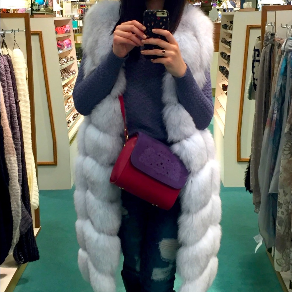 - Gorgeous Fox fur vest. Perfect condition.